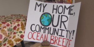 Sign saying, My Home, Our Community Ocean Breeze